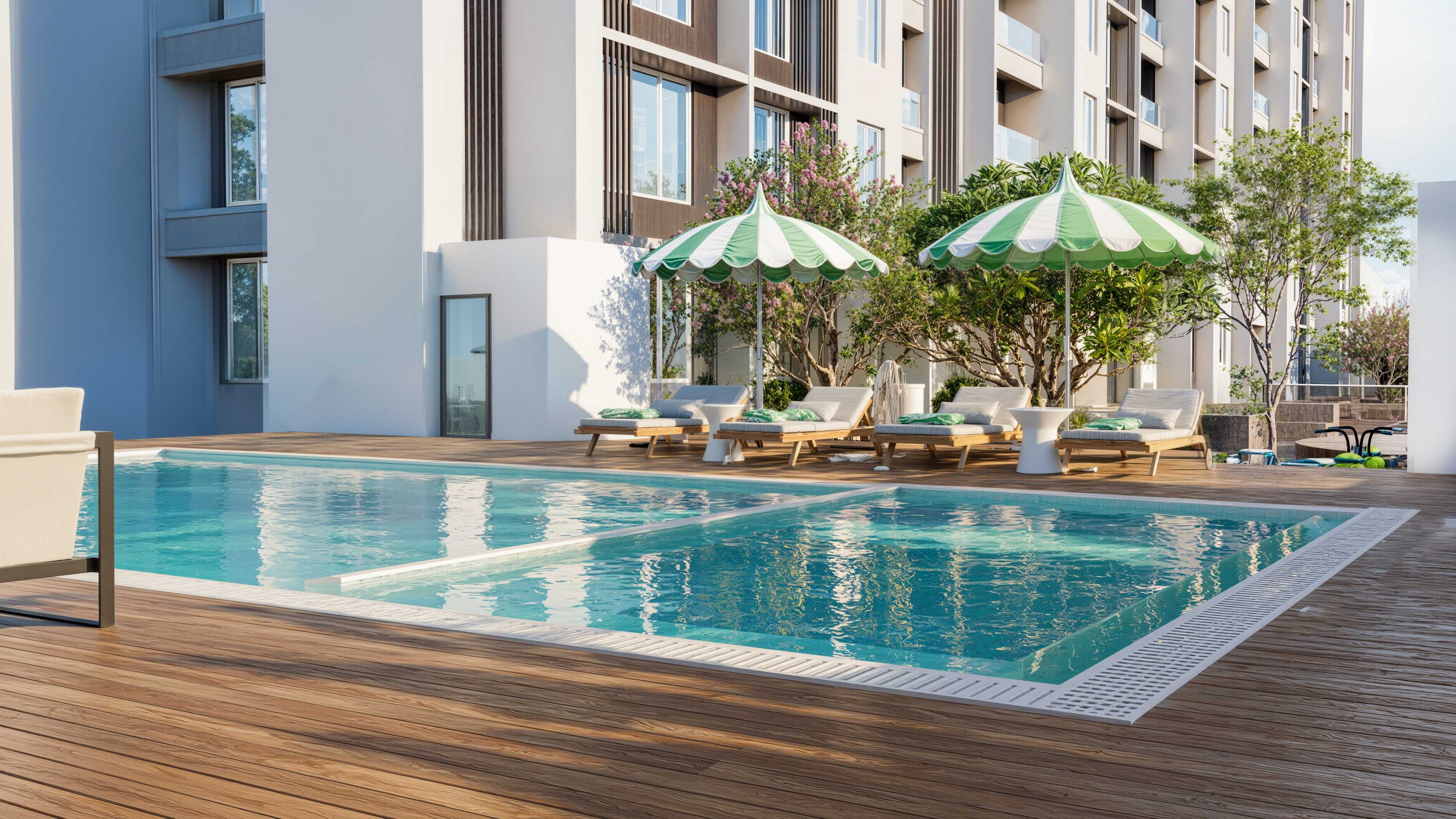 Swimming pool with loungers and parasols